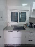 Kuchyň nebo kuchyňský kout v ubytování APARTAMENTO MAYI