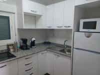 Kuchyň nebo kuchyňský kout v ubytování APARTAMENTO MAYI