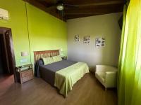 Postel nebo postele na pokoji v ubytování Hotel Rural La Covacha