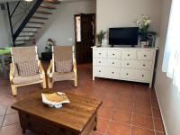 TV a/nebo společenská místnost v ubytování Hotel Rural La Covacha