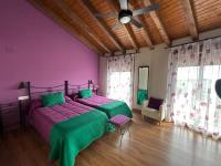 Postel nebo postele na pokoji v ubytování Hotel Rural La Covacha