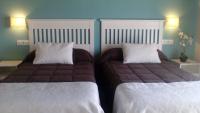Postel nebo postele na pokoji v ubytování Hotel Rural La Covacha