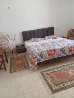 Postel nebo postele na pokoji v ubytování Jerba Rent Home