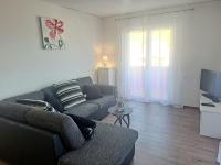 Televízia a/alebo spoločenská miestnosť v ubytovaní Lifestyle apartment Podstrana
