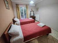 Postel nebo postele na pokoji v ubytování Villa Mirella