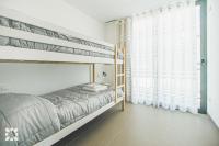 Postel nebo postele na pokoji v ubytování Villa Dunamoon by Abahana Villas