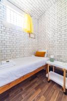 Lotus GuestHouseにあるベッド