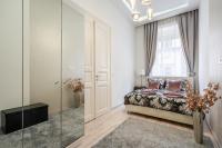 A bed or beds in a room at Király 35 Luxury Apartment with free parking