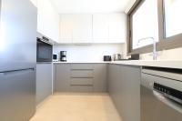 Kuchyň nebo kuchyňský kout v ubytování Serenity Waves Villa 27