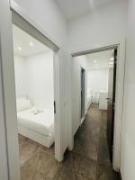 Posteľ alebo postele v izbe v ubytovaní Vila Zrina - Apartmani