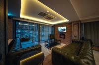 A television and/or entertainment centre at Alfa Suites & SPA