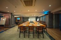 A television and/or entertainment centre at Alfa Suites & SPA