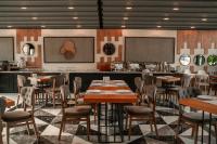 A restaurant or other place to eat at Alfa Suites & SPA