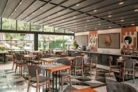 A restaurant or other place to eat at Alfa Suites & SPA