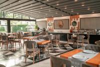 A restaurant or other place to eat at Alfa Suites & SPA