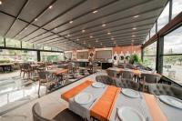 A restaurant or other place to eat at Alfa Suites & SPA