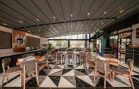 A restaurant or other place to eat at Alfa Suites & SPA