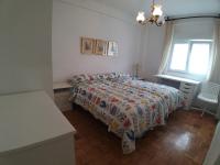 Postel nebo postele na pokoji v ubytování Santander Pinares del Sardinero