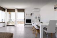 Televízia a/alebo spoločenská miestnosť v ubytovaní Beach Apartment in Calafell