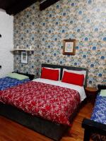 A bed or beds in a room at B&B VILLA LUPIDI