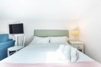 Posteľ alebo postele v izbe v ubytovaní WintowinRentals Cómodo Estudio en Málaga.