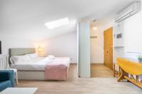 Posteľ alebo postele v izbe v ubytovaní WintowinRentals Cómodo Estudio en Málaga.