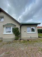 a house with two windows and a roof at Astay in Malmö