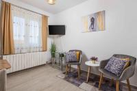 Televízia a/alebo spoločenská miestnosť v ubytovaní Apartment in Kraljevica 33071