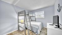 Ein Bett oder Betten in einem Zimmer der Unterkunft Cozy renovated ground floor unit - Golf Villa - on the Golf Course