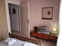 Postel nebo postele na pokoji v ubytování Aggelos House in Kalamitsi