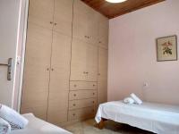 Postel nebo postele na pokoji v ubytování Aggelos House in Kalamitsi