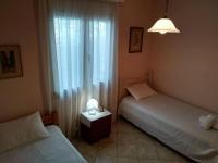 Postel nebo postele na pokoji v ubytování Aggelos House in Kalamitsi