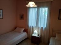 Postel nebo postele na pokoji v ubytování Aggelos House in Kalamitsi