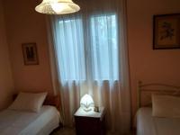 Postel nebo postele na pokoji v ubytování Aggelos House in Kalamitsi