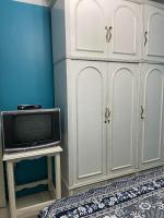 TV a/nebo společenská místnost v ubytování Luxury Condo Sidi Bishr, Behind Mahrousa Hotel