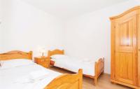 Posteľ alebo postele v izbe v ubytovaní Lovely Apartment In Malinska With Wifi