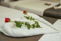 Postel nebo postele na pokoji v ubytování Royal Plaza City