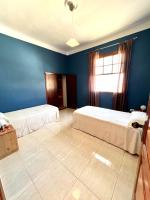 Postel nebo postele na pokoji v ubytování CHC - Apartamento Los Topetes