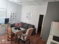 Televízia a/alebo spoločenská miestnosť v ubytovaní Hotel Casa Marchena