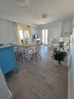 A television and/or entertainment centre at TOP APARTMENT! Frente al mar y gran terraza