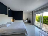Posteľ alebo postele v izbe v ubytovaní Appartement Villa d'Aurore