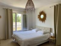 Posteľ alebo postele v izbe v ubytovaní Appartement Villa d'Aurore