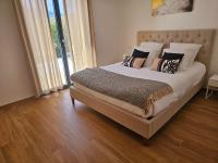Posteľ alebo postele v izbe v ubytovaní Résidence Villas Chléa