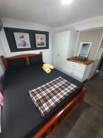 BIDESI VILLA Apartmentsにあるベッド