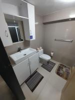 BIDESI VILLA Apartmentsにあるベッド