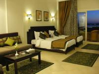 Postel nebo postele na pokoji v ubytování Sunset Boutique Hotel Sahl Hasheesh