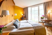 Ein Bett oder Betten in einem Zimmer der Unterkunft Hotel Gasthof Lercher