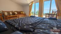 Postel nebo postele na pokoji v ubytování Arode Villa Dionysus