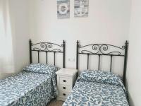 Posteľ alebo postele v izbe v ubytovaní Apartamentos Franch