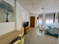 Televízia a/alebo spoločenská miestnosť v ubytovaní Apartamentos Villa Torcal